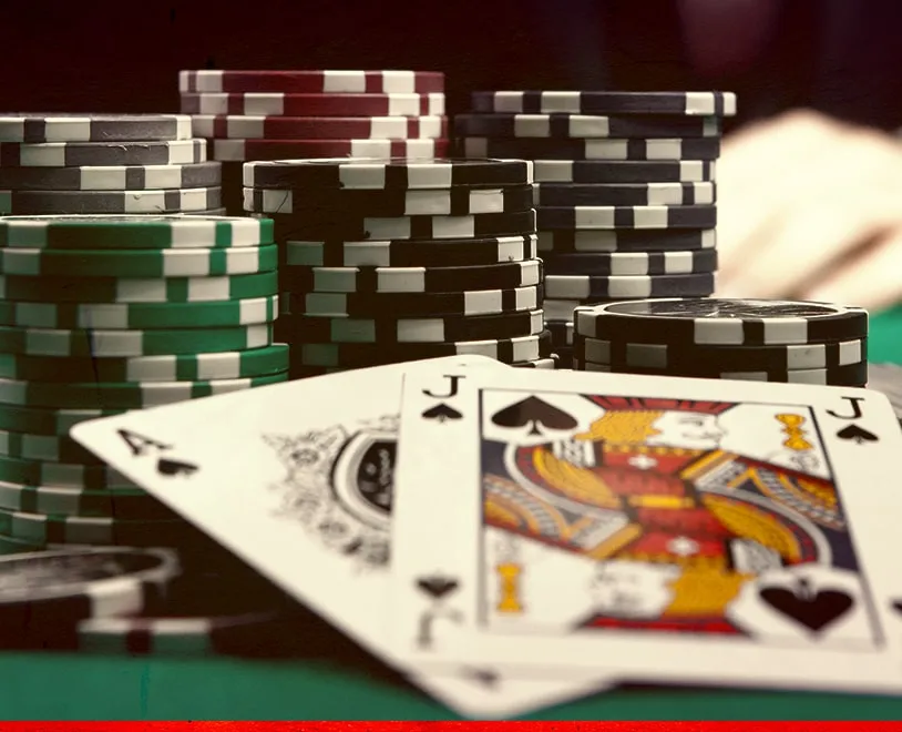 Fixed-Limit Texas Hold'em cards and chips on the background